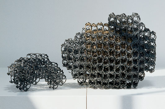 6tt INYO (95-2), Tsuruko Tanikawa, brass and iron wire, coiled and burned, 7.5" x 6.5" x 14", 1995
