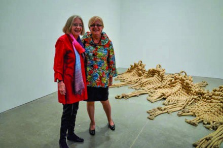 Françoise Grossen and Kathleen Mangan in front of Grossen’s Inchworm sculpture at the opeing of Fiber: Sculpture 1960–present opening at the ICEA