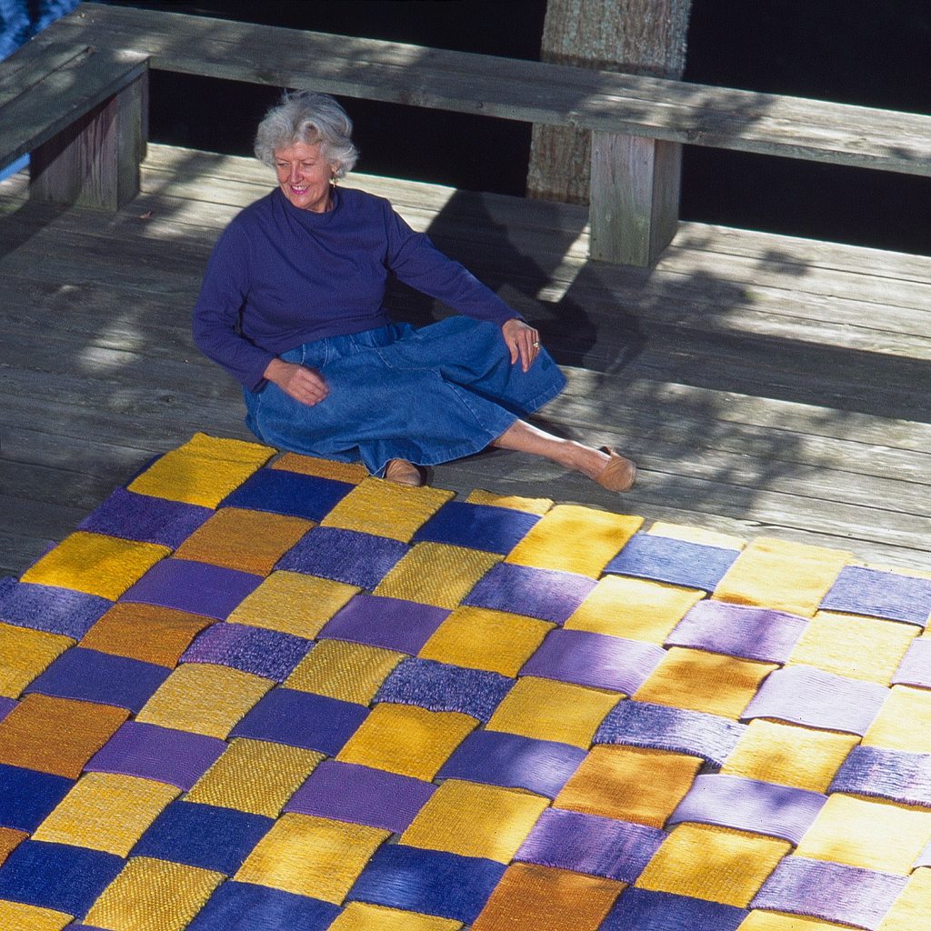 Sheila Hicks on her Conneticut deck. An outtake  from our catalog #13 Sheila Hicks, Joined by seven artists from Japan. Her work Chaine et trame interchangeable ( Interchangeable Warp and Weft)  is now in the permanent collection of the Dallas Museum of Art.  Photo By Tom Grotta