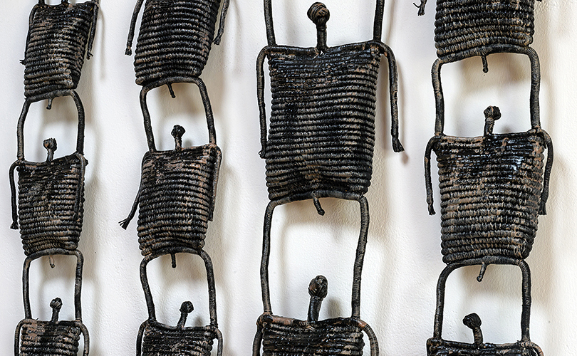 Waxed linen wall figures by Mary Giles
