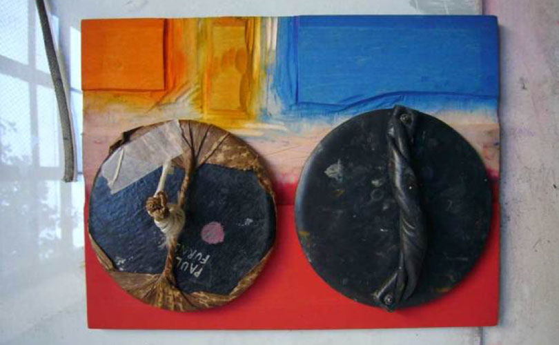 Printing barens on an inked piece of woodblock