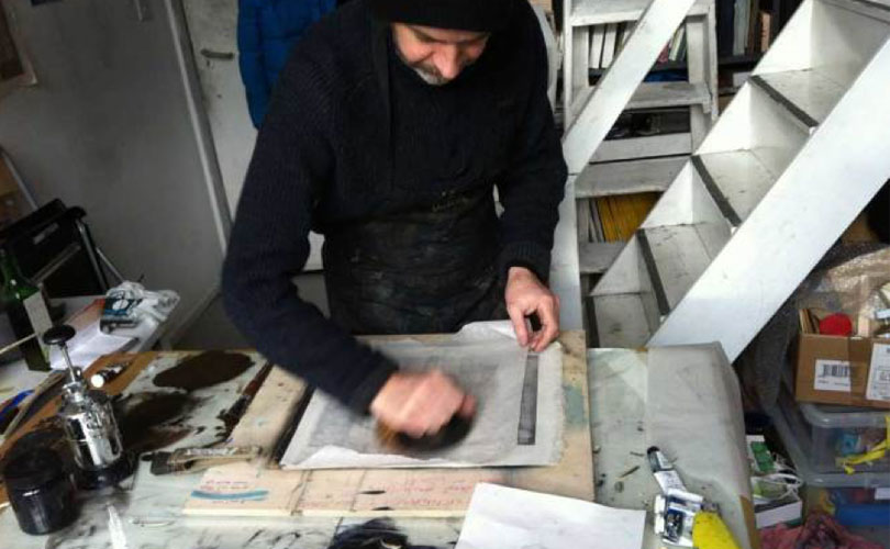 Paul printing in his studio