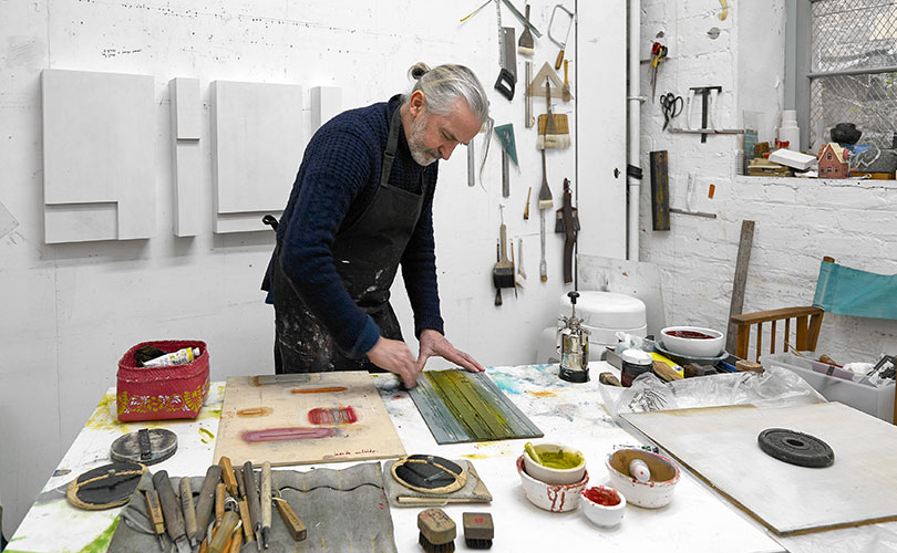 Paul Furneaux printing in his studio